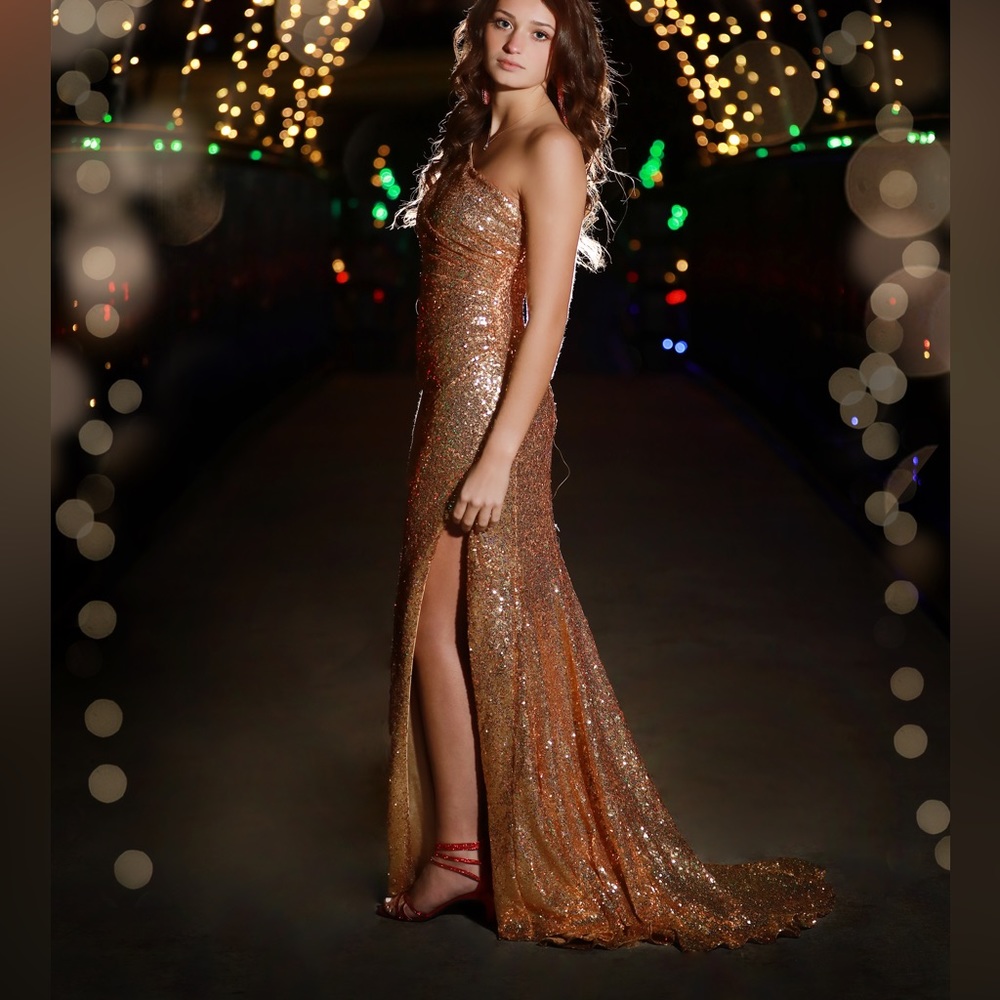 Gorgeous gold gown. Worn once for dance and once for pictures listed